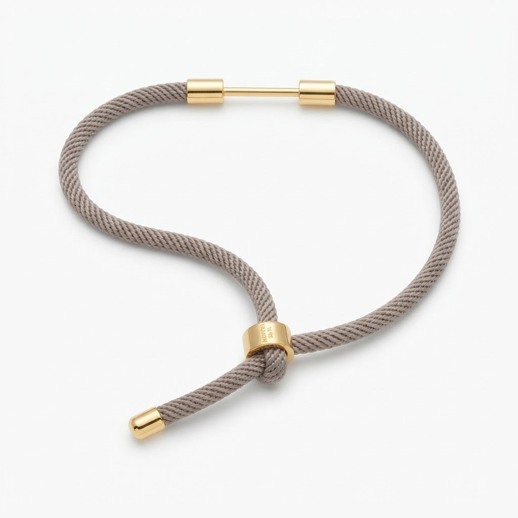 Bracciale Regolabile in Corda Intrecciata con Dettagli in Acciaio Inossidabile Dorato
